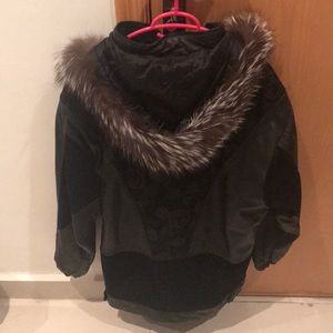 Leather jacket with fur hood